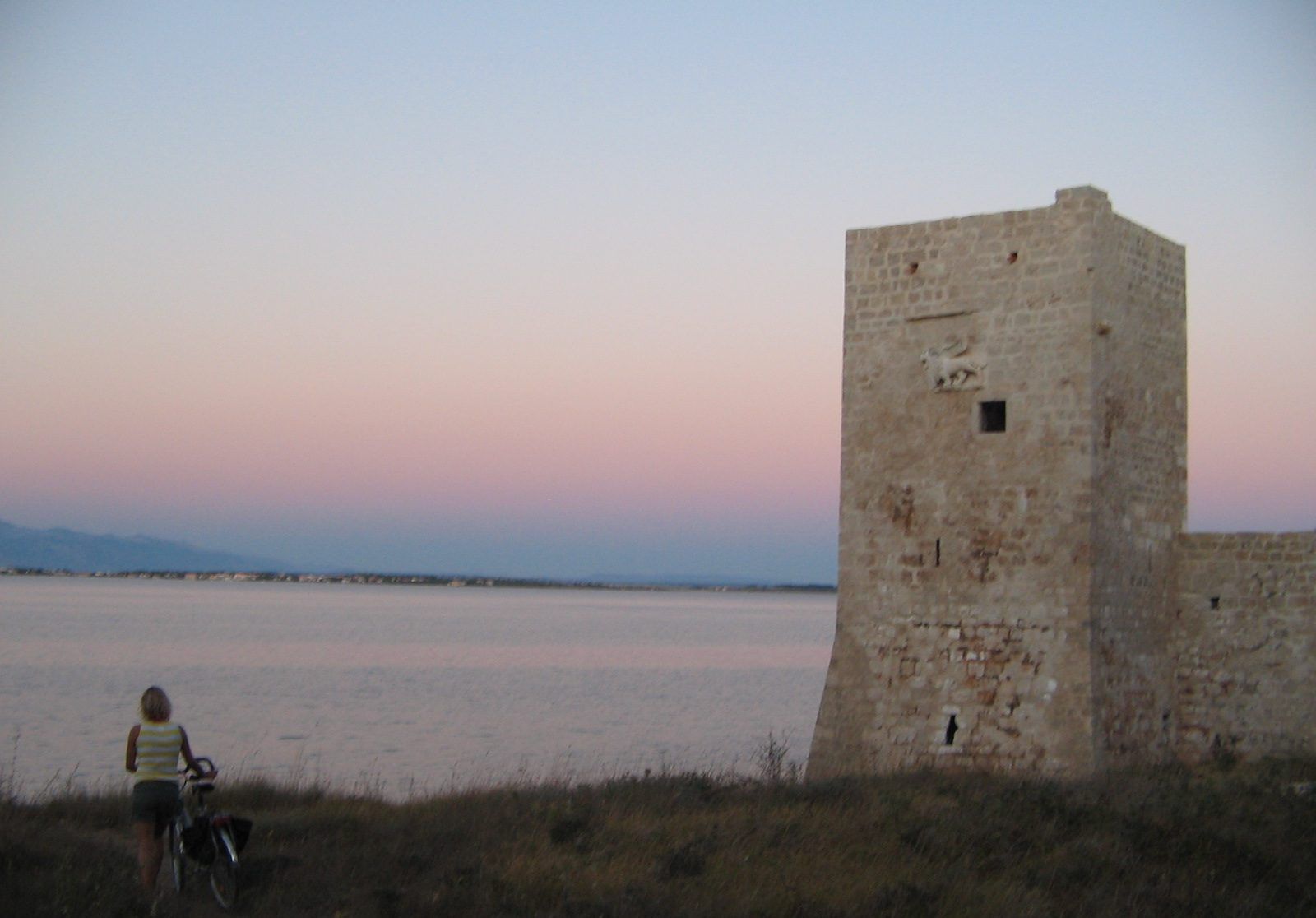 The Kaštelina fortress on the coast of Vir at dusk